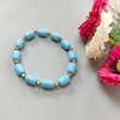 Blue Synthetic Turquoise Beads Bracelet: 44.90cts Simulant Turquoise Baguette Plain Stretchable Brass Bracelet 11mm 6"