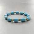 Blue Synthetic Turquoise Beads Bracelet: 44.90cts Simulant Turquoise Baguette Plain Stretchable Brass Bracelet 11mm 6"