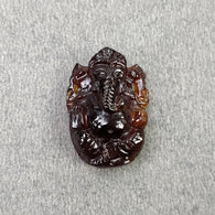 Hessonite carving